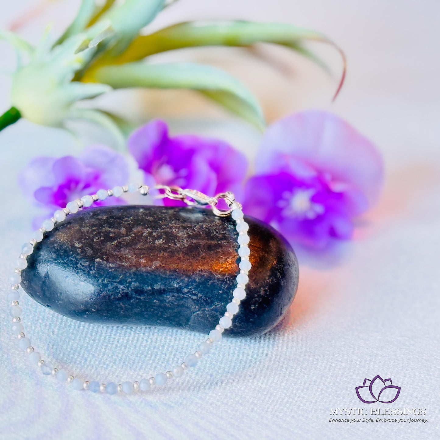 a close up of a rock with a chain on it