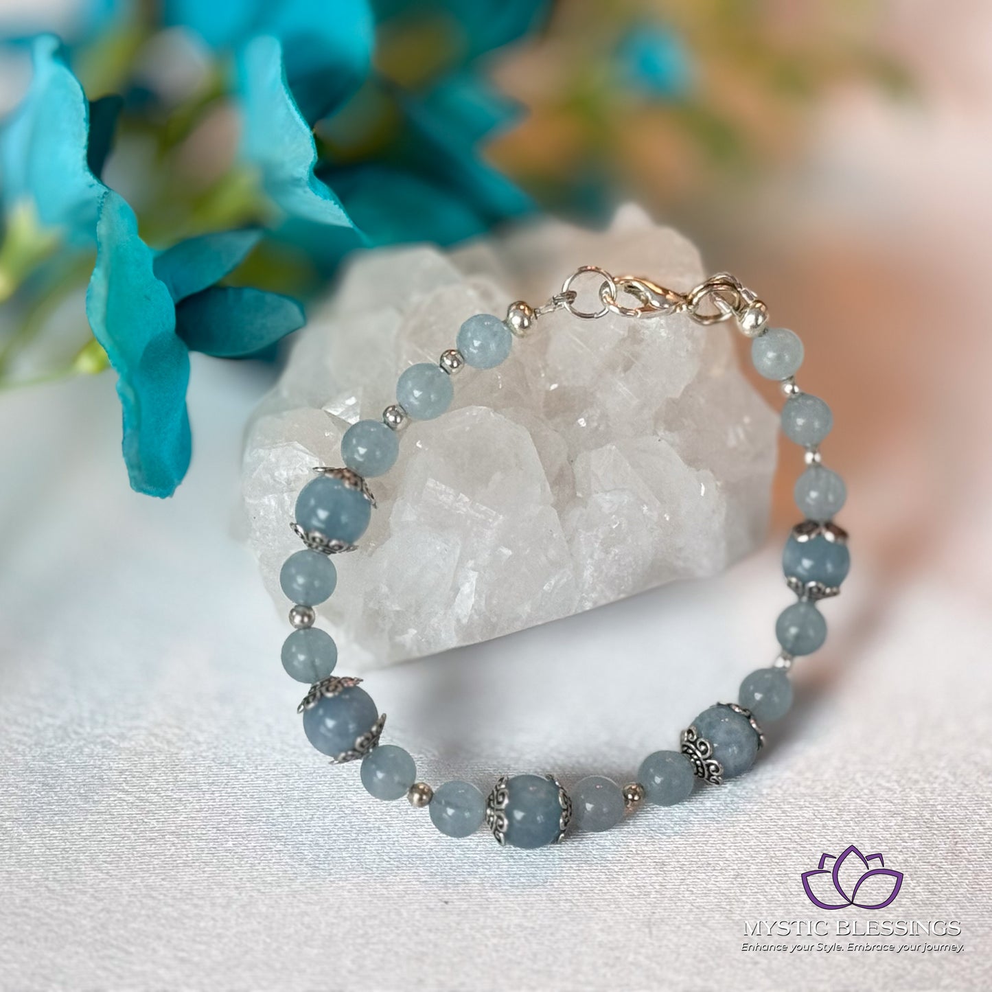 a close up of a bracelet on a table