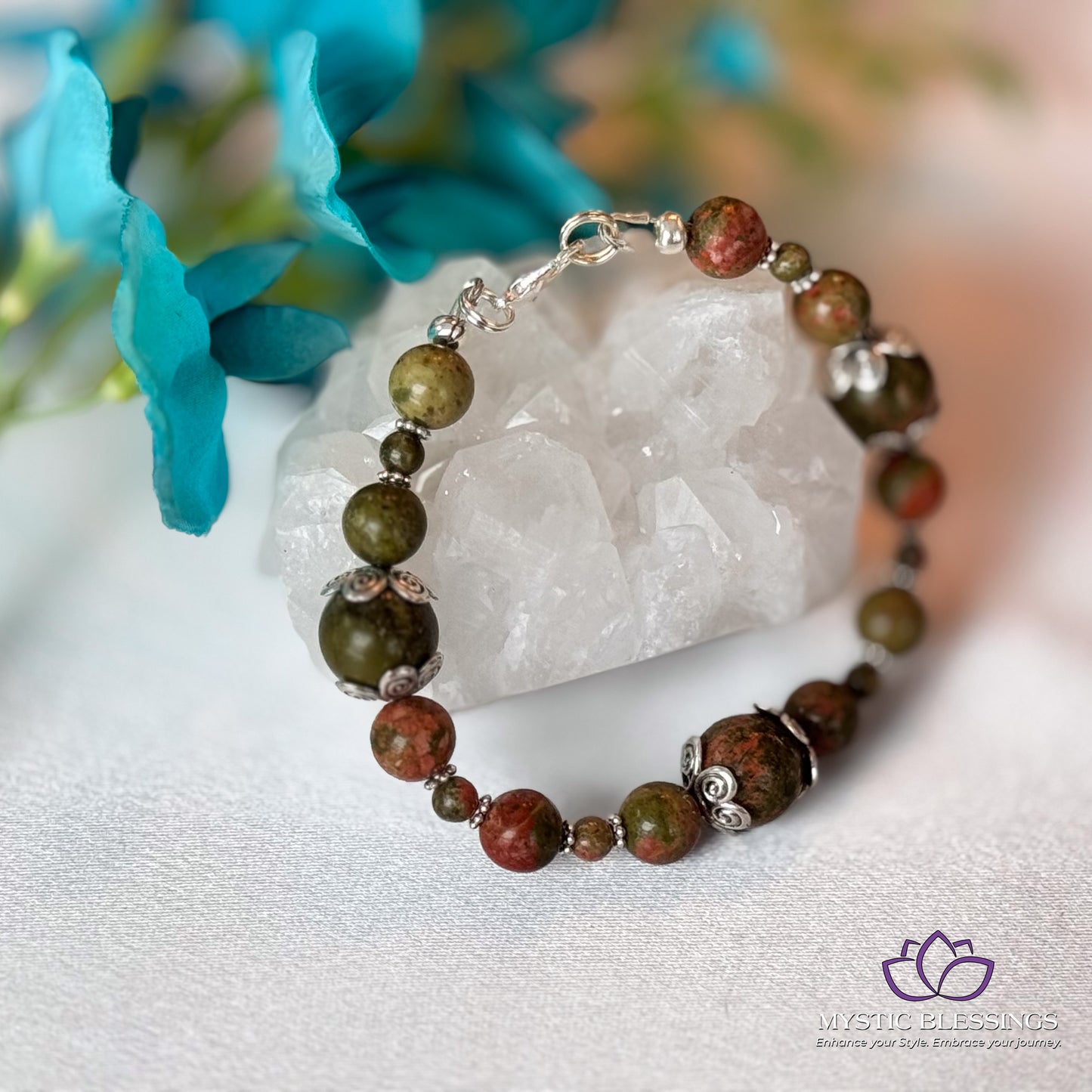 a close up of a bracelet on a table