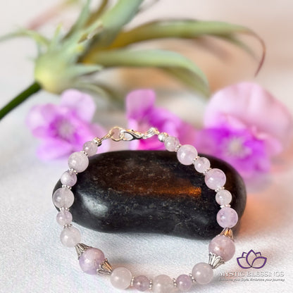 a close up of a bracelet on a table