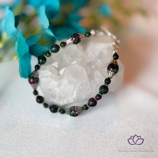 a close up of a bracelet on a table