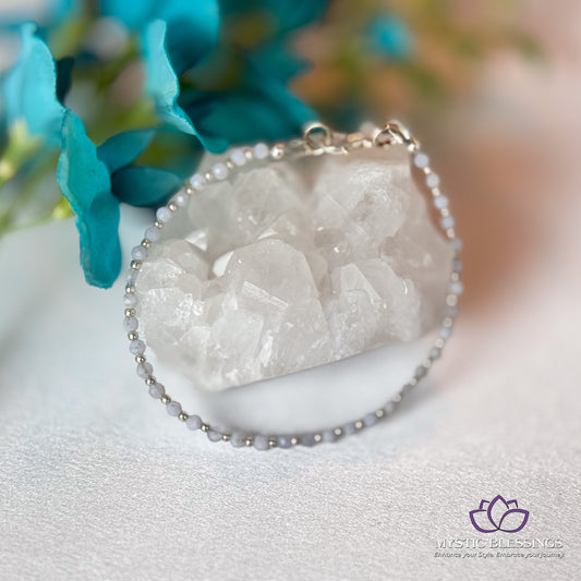 a piece of jewelry sitting on top of a table